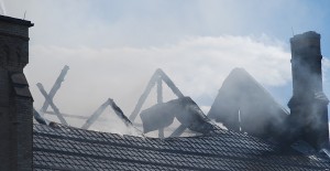 The heavy beams which characterized the inside of the church were reduced to cinders as fire gutted the historic landmark.