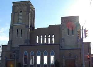 Stained glass was salvaged and removed from the façade on Thursday ahead of the impending demolition.
