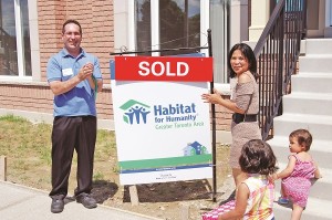 The Lippas, and their daughters, prepare to make the first steps into their new home.
