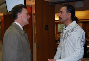 Candidate Tom Mrakas, right, speaks to columnist Stephen Somerville