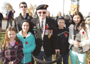 Veteran Frank Young attended Tuesday's service with his great-grandchildren.