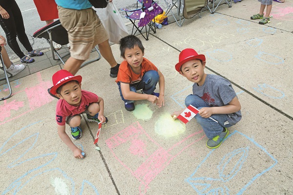 Before Saturday morning's traditional Canada Day parade, kids were invited to leave their mark outside the Aurora Public Library with chalk drawings wishing Canada a Happy Birthday.
